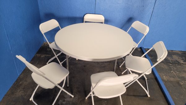 Close up of 48" round table with chairs