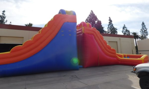 24ft Inflatable Slide next to 20ft Inflatable Slide