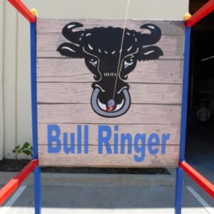 Bull Ringer Carnival Game - shows a ring on a string with a bull photo backround with a hook sticking out from the bull's nose area